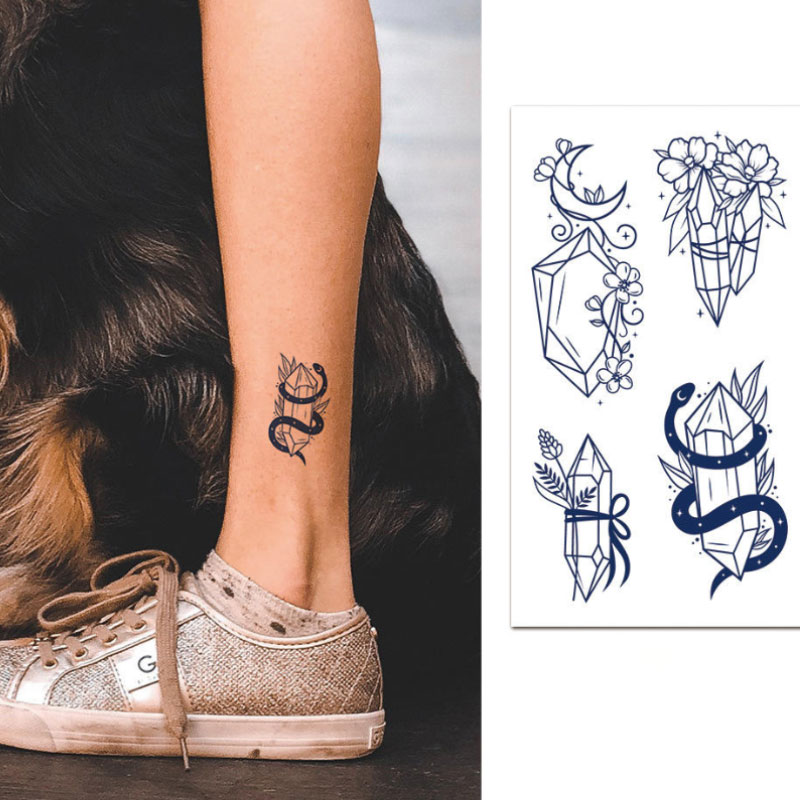 Woman Thigh Writing Tattoo