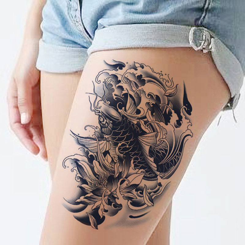 feminine classy thigh tattoos