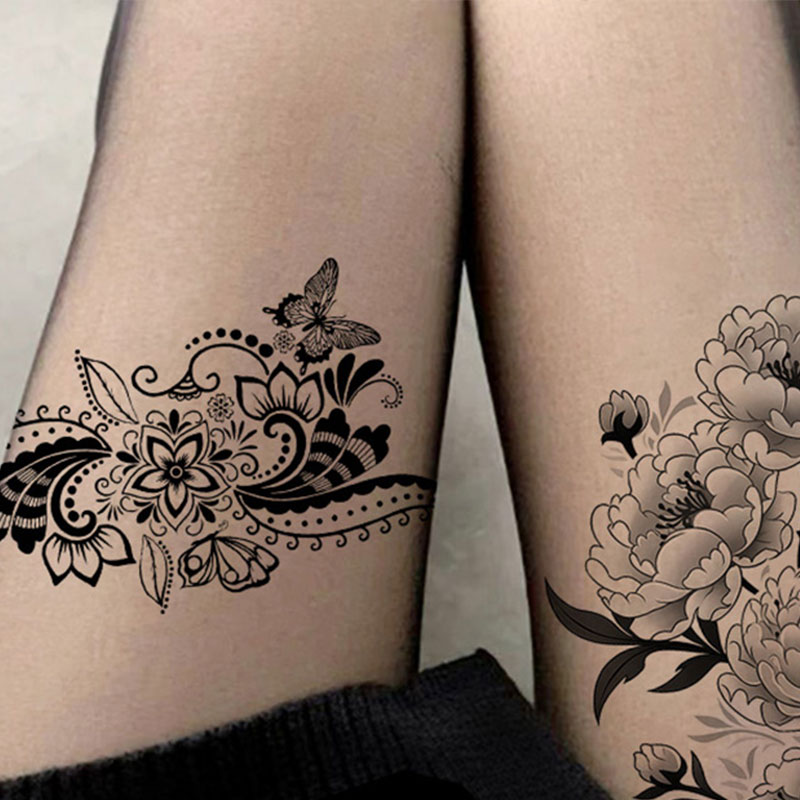 woman thigh tattoos
