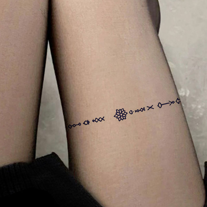 women thigh tattoos