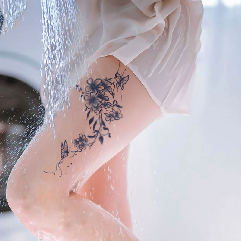 Thigh Tattoos of Flowers​
