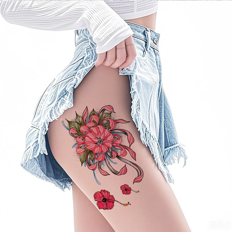 Tattoos Of Flowers On Thigh