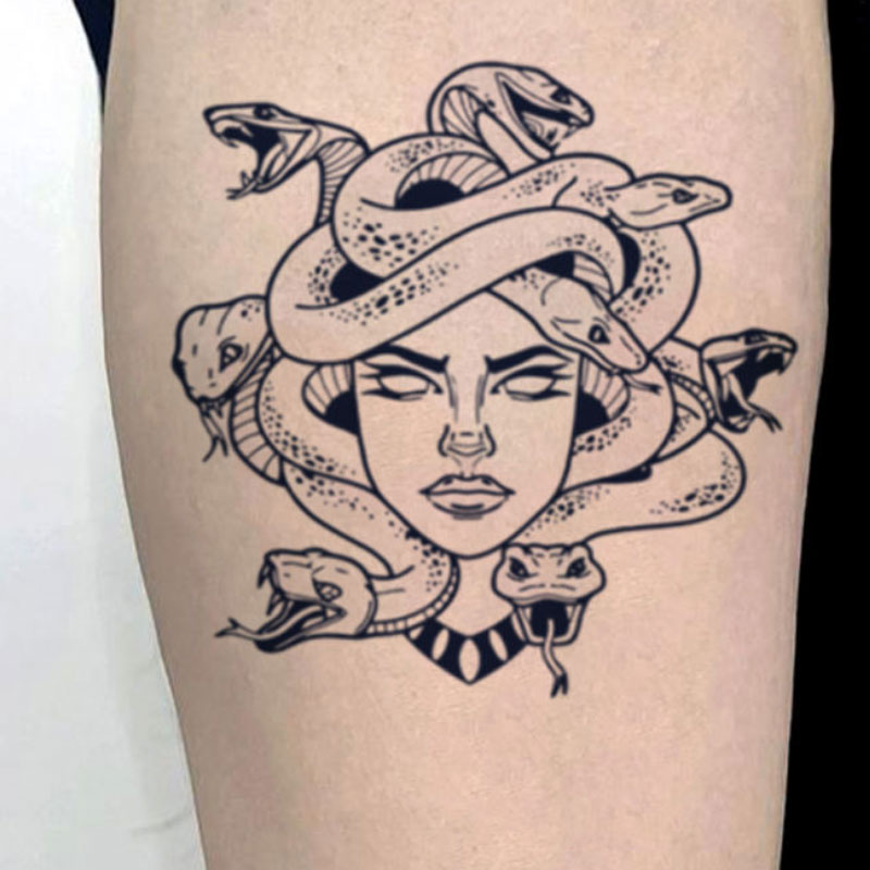 Girly Skull Thigh Tattoo